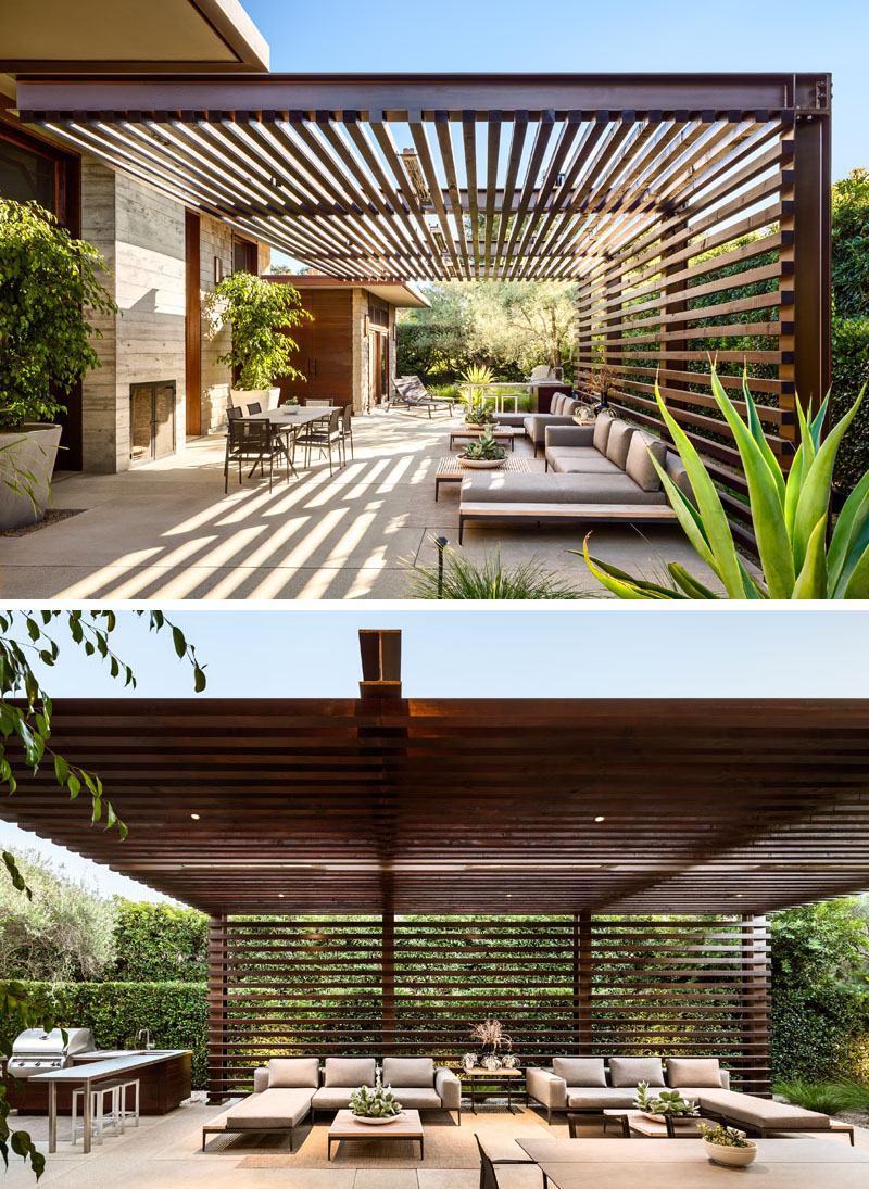 This outdoor living space makes the most of the louvre roof and wall to create a super comfortable space