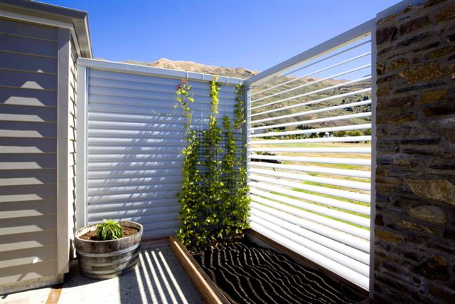 Manually operable louvres