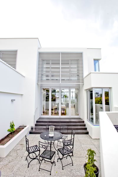 Outdoor patio with louvre screens