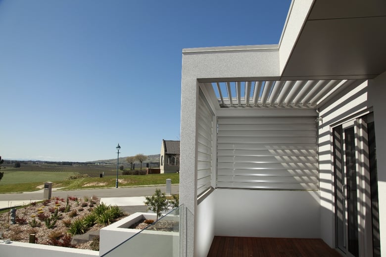 Outdoor room with louvre shutters