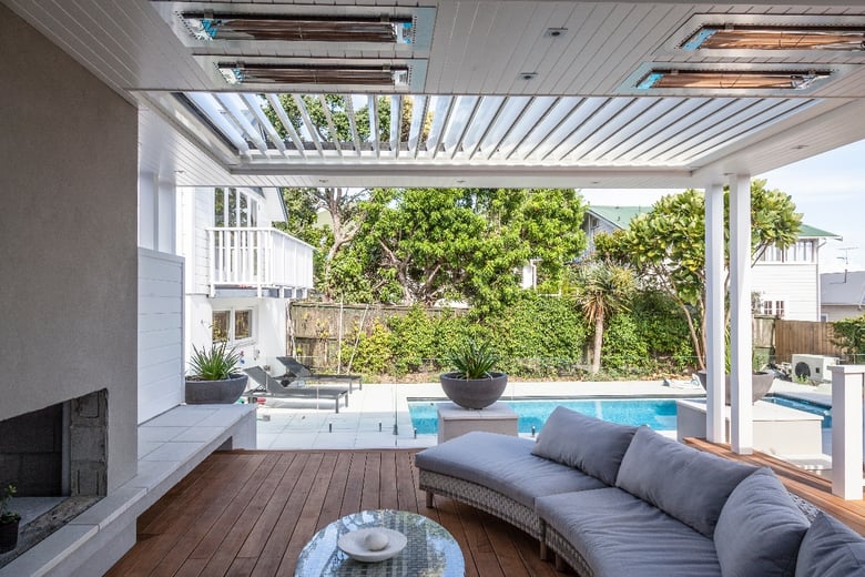 Heaters installed in the roof of an outdoor room