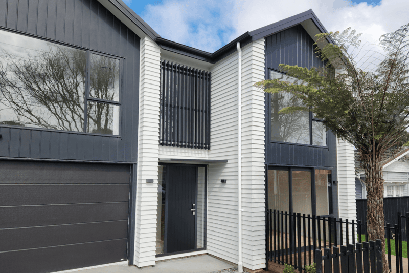 Modern townhouse featuring entrance canopies