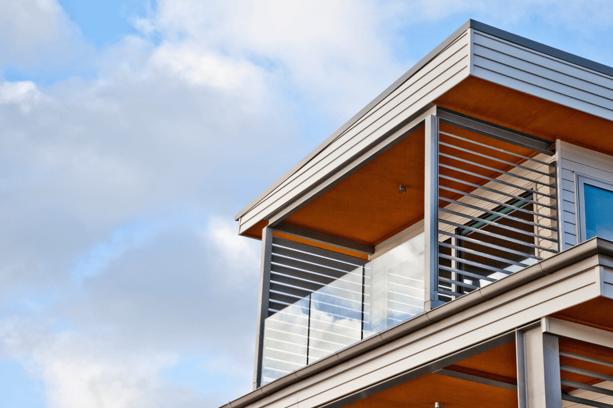 Manual shutters added to the sides of a balcony