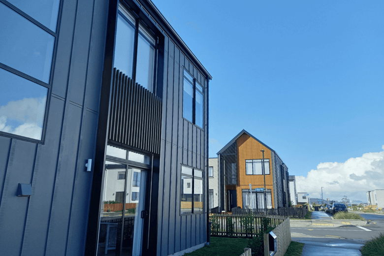 Housing development with window shrouds