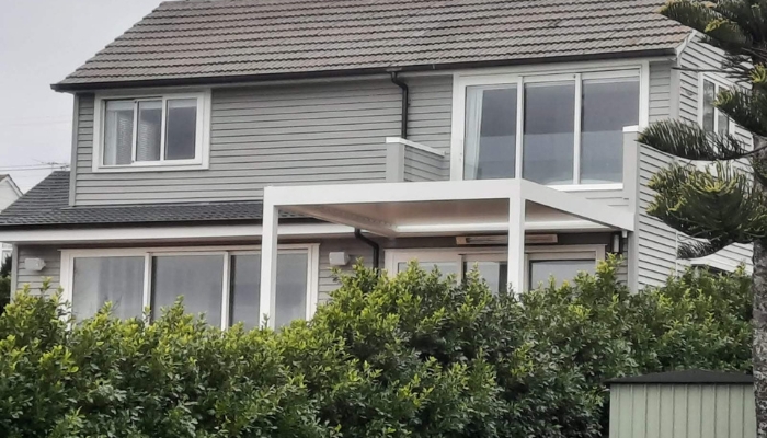 Residential home with opening louvre roof