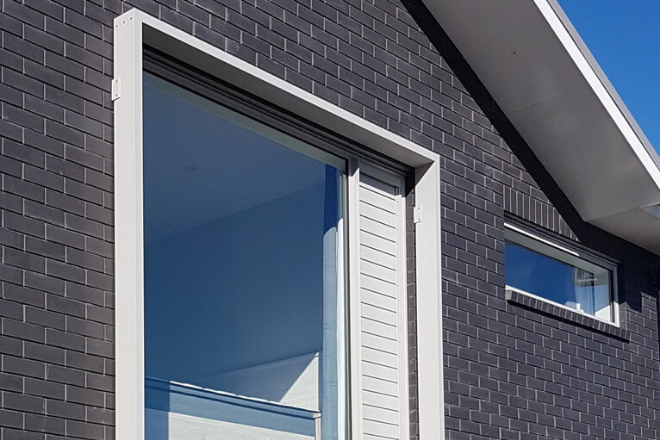 Hobsonville Point home with window shroud Hobsonville Point home with window shroud