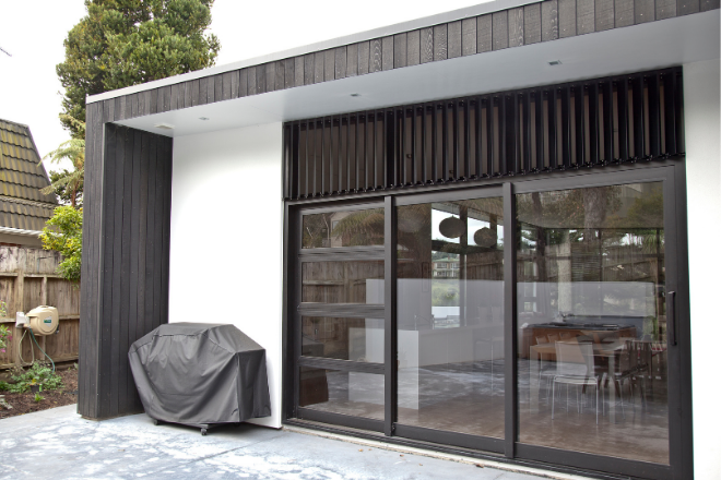 Residential home with fixed louvre blades Residential home with fixed louvre blades