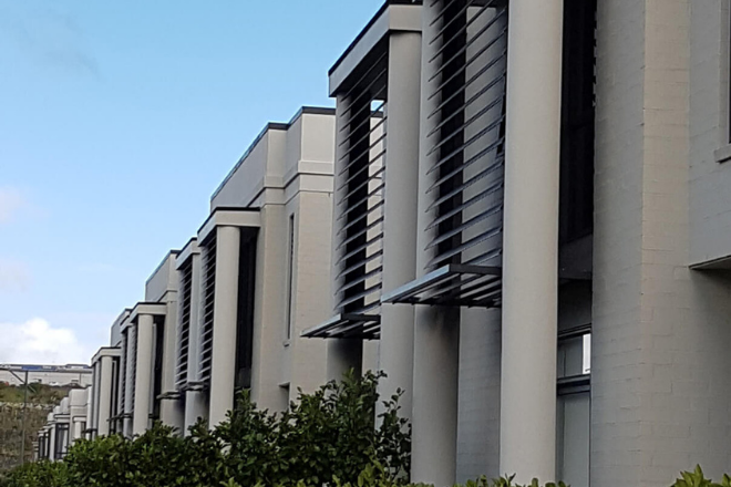 Aluminium louvre facade products for a housing development Aluminium louvre facade products for a housing development