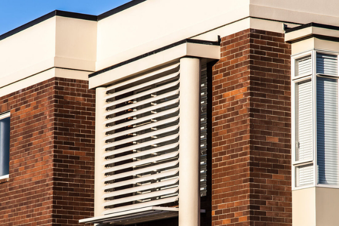 Aluminium louvre blades on the exterior of a home Aluminium louvre blades on the exterior of a home